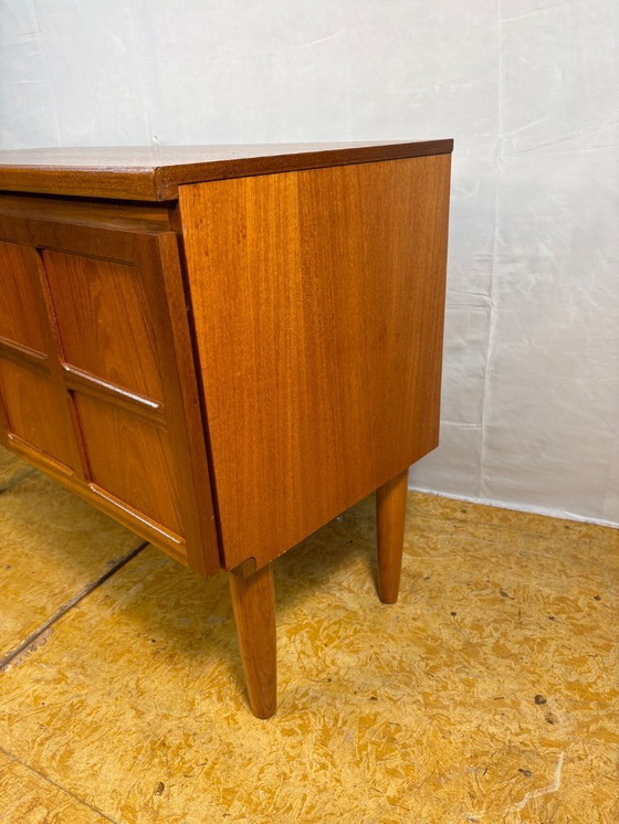 Image 1 of Mid-Century Retro Vintage Teak Sideboard by Nathan 1960s  Square Design • Two Doors • British Design Classic  A striking mid-cen