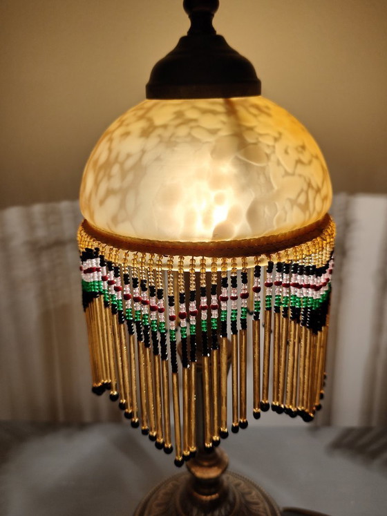 Image 1 of Antieke gouden tafellamp met kwastjes