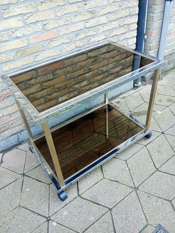 Image 1 of Belgo chrome rolling table bar table