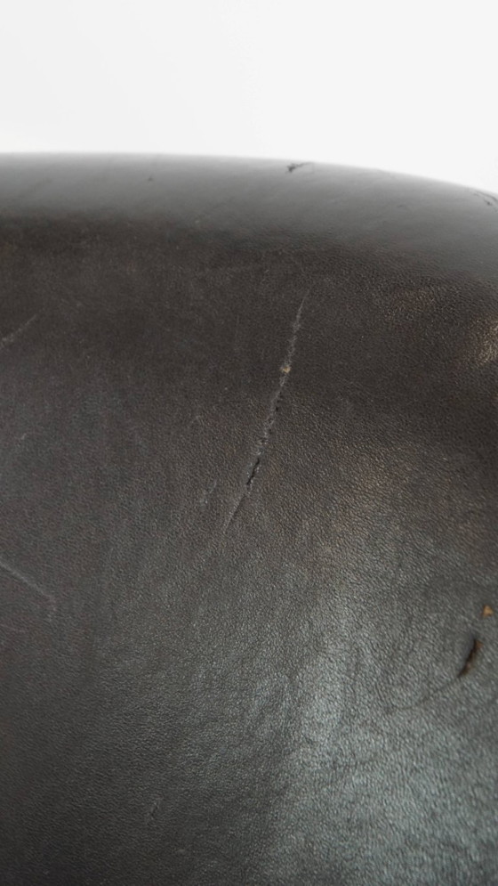 Image 1 of  Set van 2 subtiele zwart/ grijze schapenleren clubfauteuils 