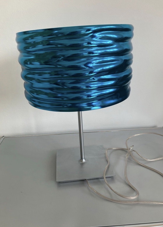 Image 1 of AQUA cil table lamp by ARTEMIDE, 2 available