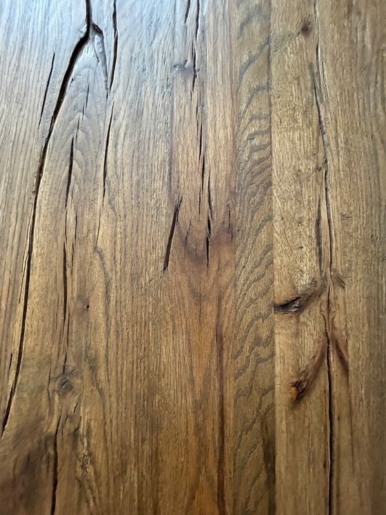 Image 1 of Prachtige grote eikenhouten eettafel met een wit stalen onderstel.