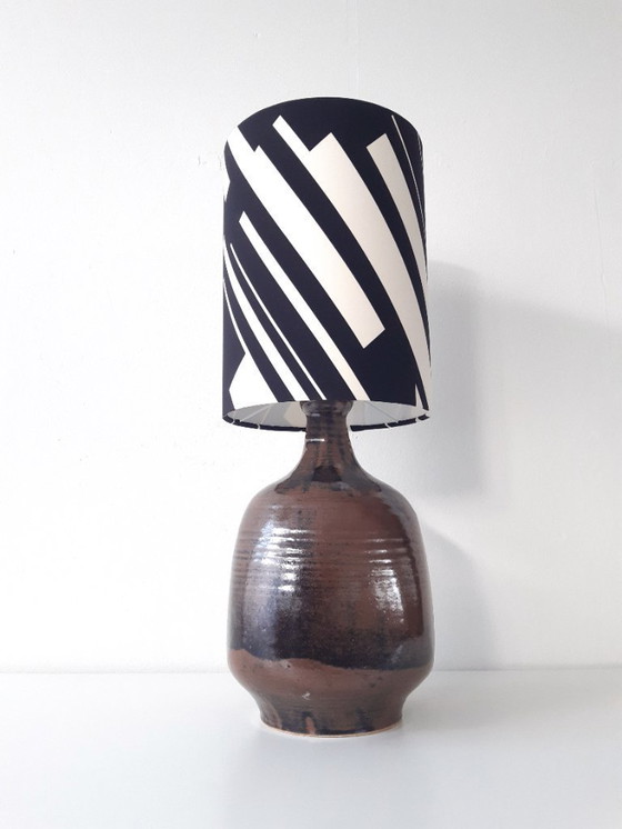 Image 1 of Sturdy dark brown ceramic Rheinfelden lamp base with new handmade lampshade of black and white graphic fabric