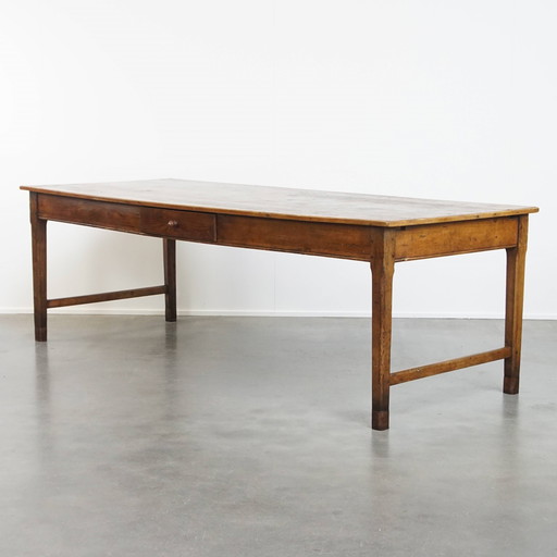 Grande table de salle à manger antique avec un tiroir