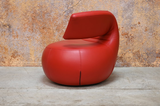 Image 1 of Red leather Leolux Gisa designer swivel armchair