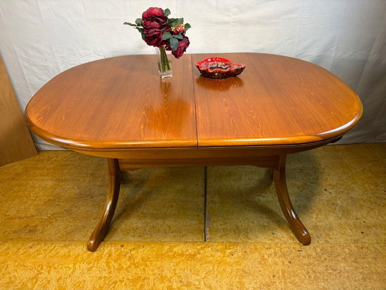 Image 1 of Mid Century Retro Teak Oval Danish Extending Dining Table (Circa 1960–1970)  A stunning mid century modern teak oval extending d