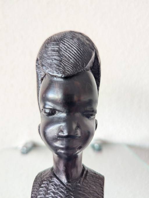 Donna africana (uomo). Testa tribale Marcari in legno intagliato in ebano