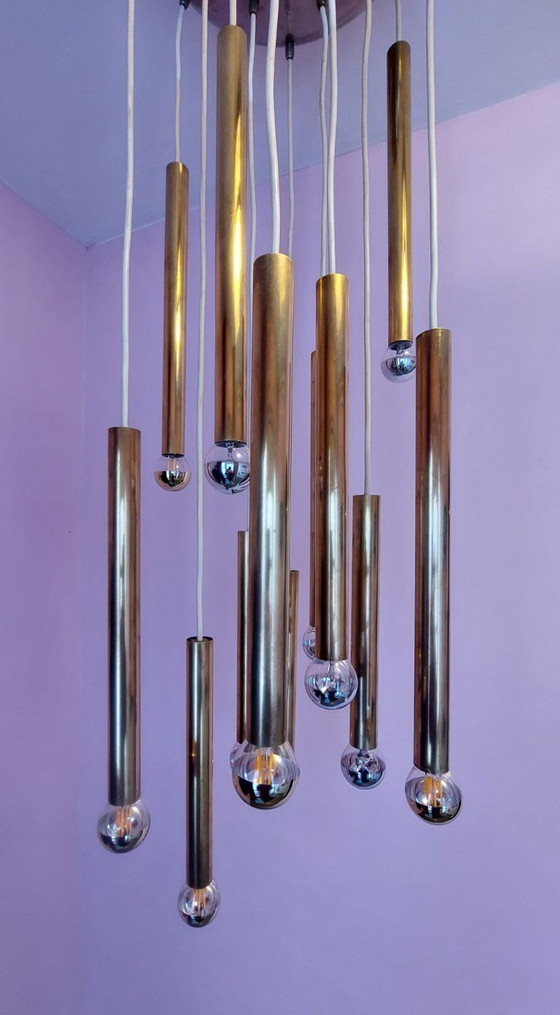 Image 1 of Lustre en laiton à 12 points lumineux.