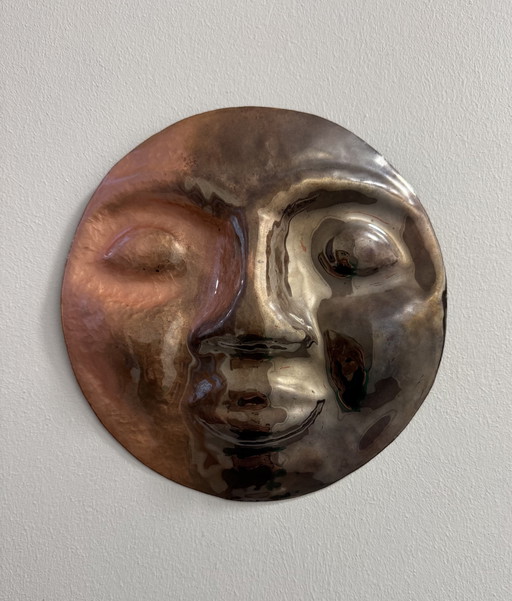 1960s repoussé and enameled brass face sculpture