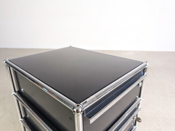 Image 1 of 6 ruote per mobile da ufficio USM Haller con serratura blu scuro