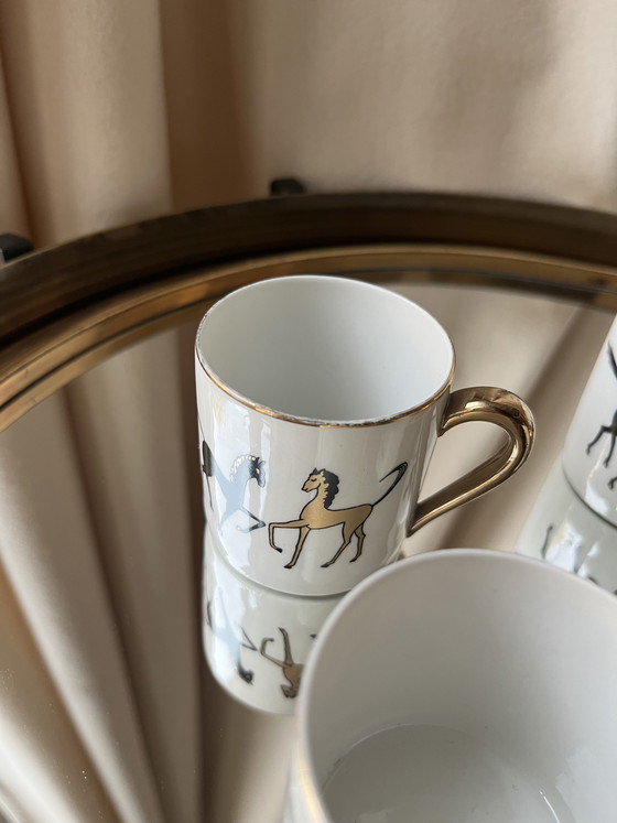 Image 1 of Set di 4 tazzine da caffè espresso vintage in porcellana francese con motivo a cavallo dorato, anni '70, stile metà secolo.