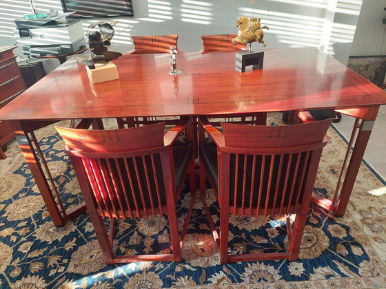 Image 1 of Rectangular long dining table with four luxurious leather-upholstered chairs by Schuitema Stadskanaal. In very good condition.