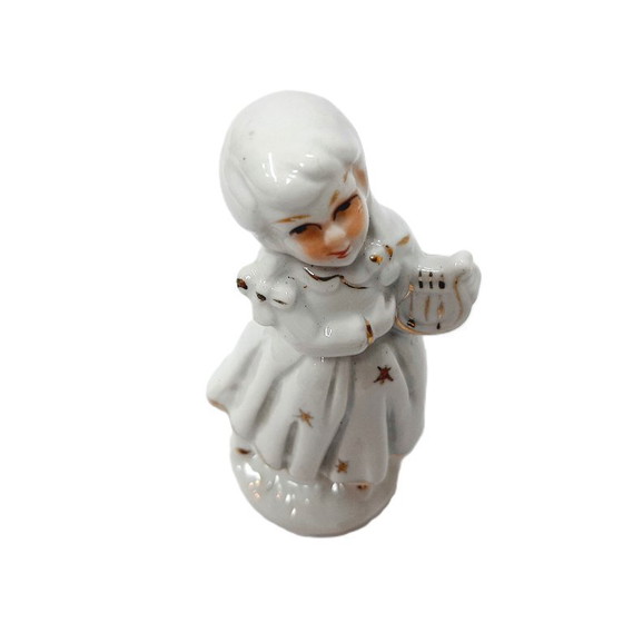 Image 1 of Statuetta in porcellana d'epoca raffigurante una ragazza che suona musica