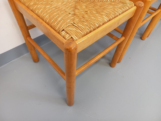 Image 1 of Suite van 4 Vintage Brutalistische stoelen in licht hout en stro uit de jaren 70 en 80