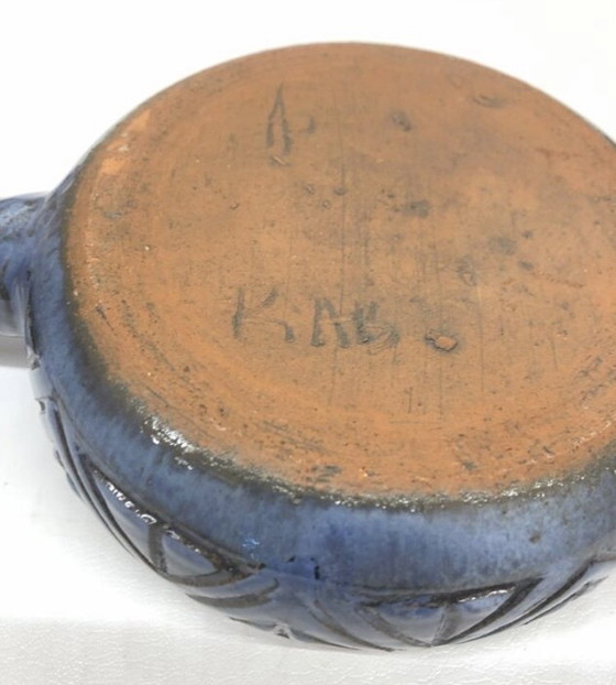 Image 1 of Ceramic fondue pot emptier