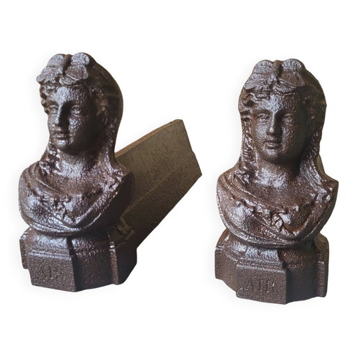 Pair of cast iron fire dogs from the 19th century