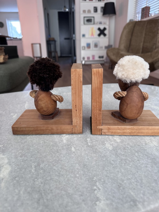 Image 1 of Hans Bolling Deens design boekensteunen Optimist & Pessimist