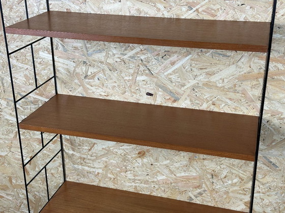 Image 1 of Anni '60-'70 scaffale in teak Scaffale a muro WHB Germania Scaffale a corda Design danese