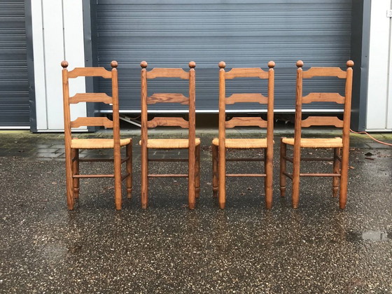 Image 1 of Esszimmerstühle aus Eiche und Geflecht Georges Robert France 1960s