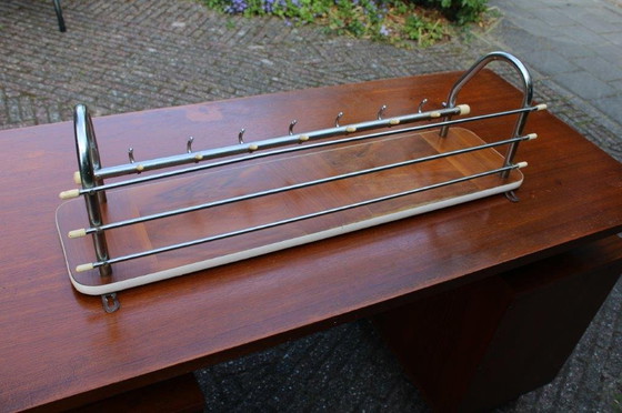 Image 1 of Vintage 60s/70s coat rack with chrome and wood
