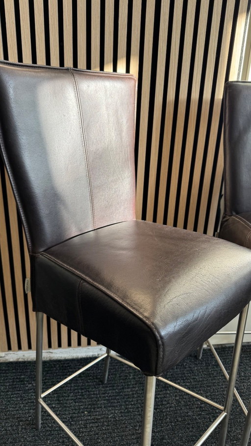 Two leather bar stools brand Foucault