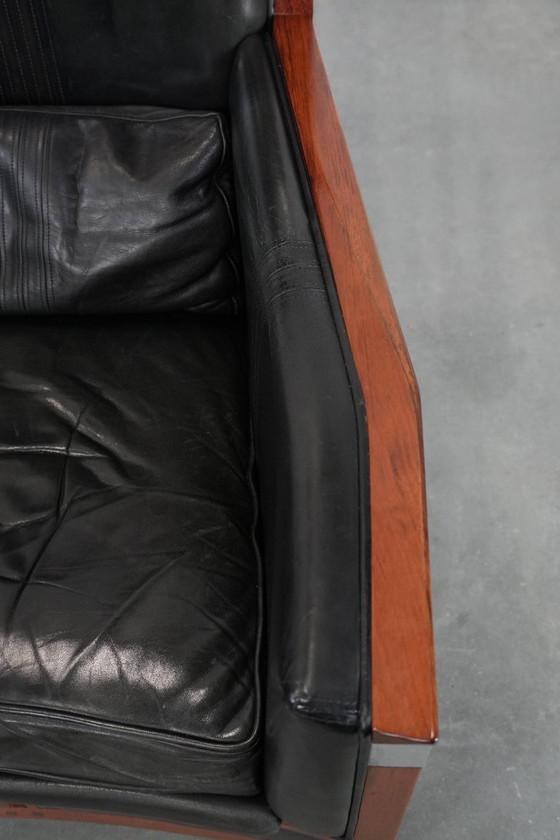 Image 1 of Black cowhide and wooden Art Deco design armchair by Schuitema from the Decoforma series with decorative cushion