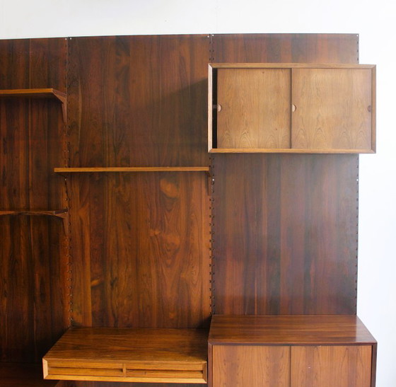 Mueble de pared en palisandro, de Poul Cadovius para Cado, Dinamarca. – Estanterías de pared, Wood (photo 9 of 17)