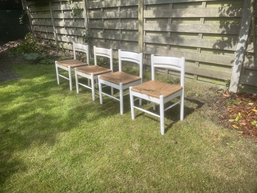 Set di 4 sedie da pranzo di metà secolo con seduta in vimini