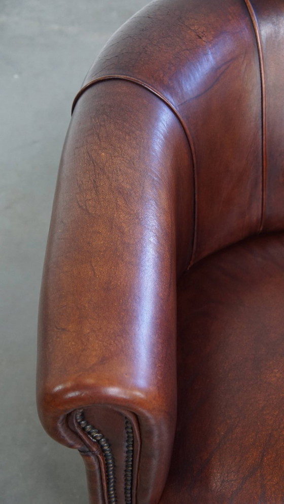 Image 1 of Sheep Leather Club Chair in a Dark Cognac Color