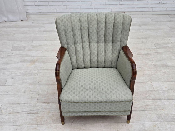 Image 1 of Deense fauteuil uit de jaren 60, lichtblauwe meubelstof, beukenhout.