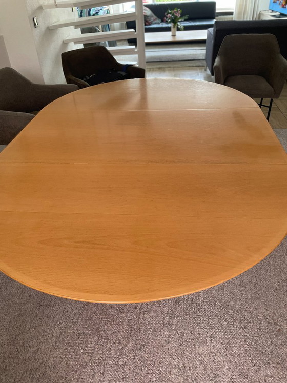 Image 1 of Oval Arco table with granite base