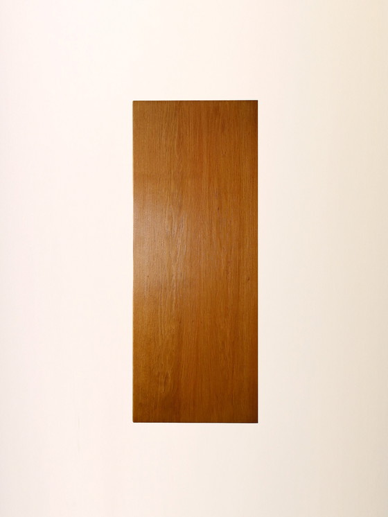 Image 1 of Scandinavische eiken kast met geweven rotan deuren