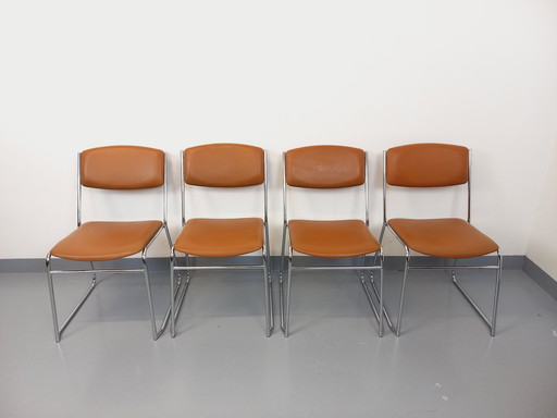 Suite of 4 vintage 70s sled chairs in chrome-plated metal and cognac skai