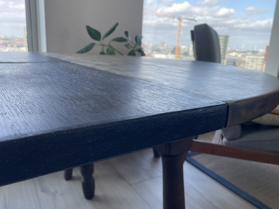 Image 1 of Round extendible table