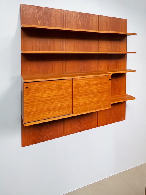 Wall unit with cupboard and shelves