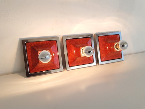Image 1 of Set of 3 orange ceramic MCM wall lights, wall scones in chrome frame