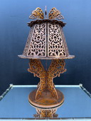 Openwork wooden lamp in an exotic 1960s style