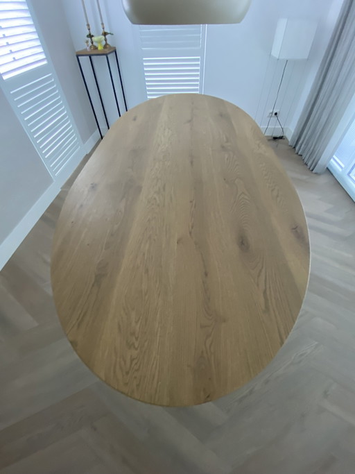 Oval dining table brushed oak with a 10 mm bevel