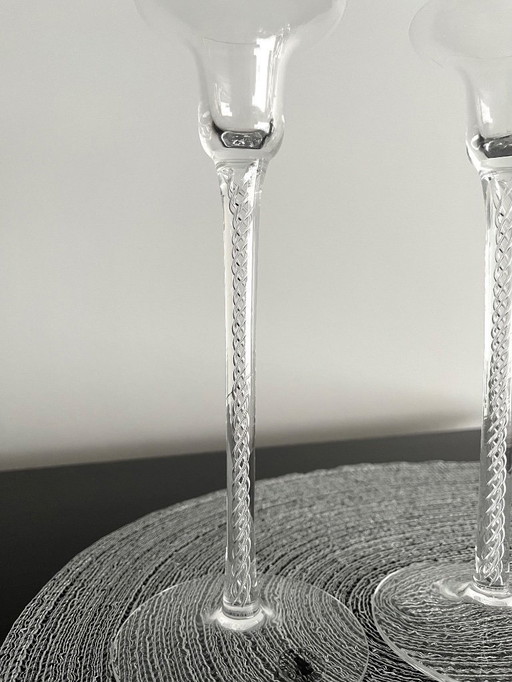 Set di due candelieri soffiati a bocca con meccanismo ad aria.