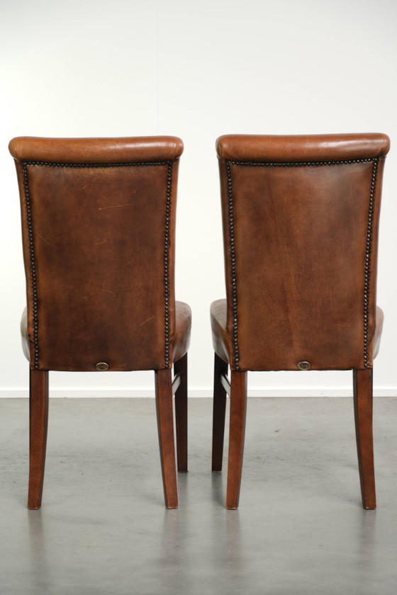 6x Begeerlijke schapenleren eetkamerstoel in een mooie cognac kleur met een mooi patina – Eetkamerstoelen (photo 4 of 17)