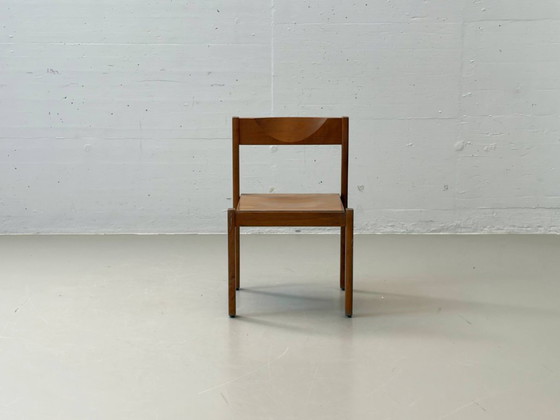 Image 1 of Set van 6 stapelbare houten stoelen in een minimalistisch design uit het midden van de vorige eeuw.