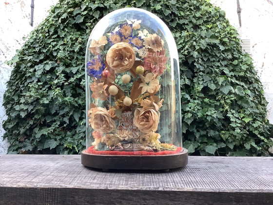 Image 1 of Flowers under a glass dome