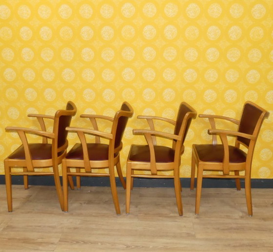 Image 1 of Armchair upholstered spring core skai leather oxblood decorative rivets office chair 60s retro