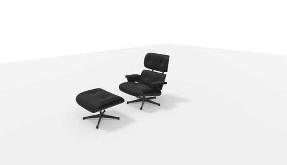 Image 1 of Originele Vitra Eames Lounge Chair + Ottoman – Tijdloos Design (2002)