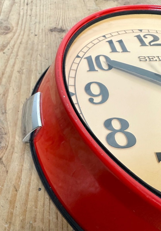 Image 1 of Vintage rode Seiko scheepswandklok, jaren 70