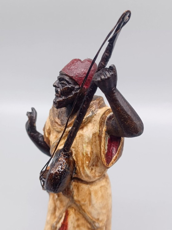 Image 1 of Ecole Orientaliste du XXème siècle, Musicien de rue en métal belle patine