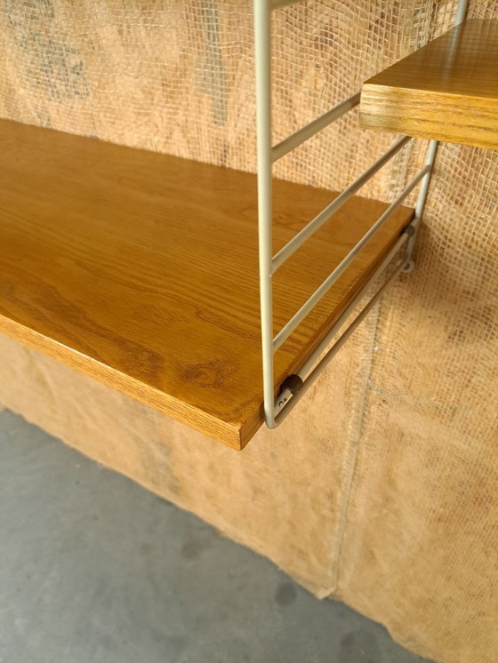 Image 1 of Sistema di parete modulare String con armadio e ripiani