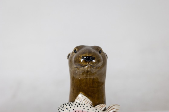 Image 1 of Valérie Courtet. Loutre Tenant un Poisson. Contemporain.