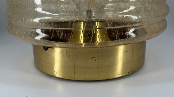 Image 1 of Vintage wand- en plafondlamp in Space Age-stijl met amberkleurig glas, circa jaren 70.