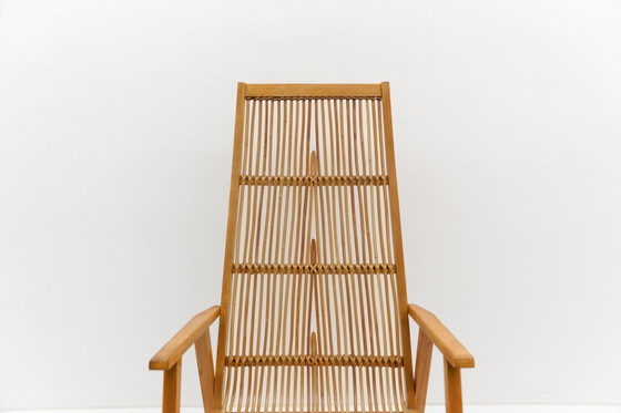 Image 1 of Sedia a dondolo in legno e rattan della Deutsche Werkstätten Hellerau, anni '60